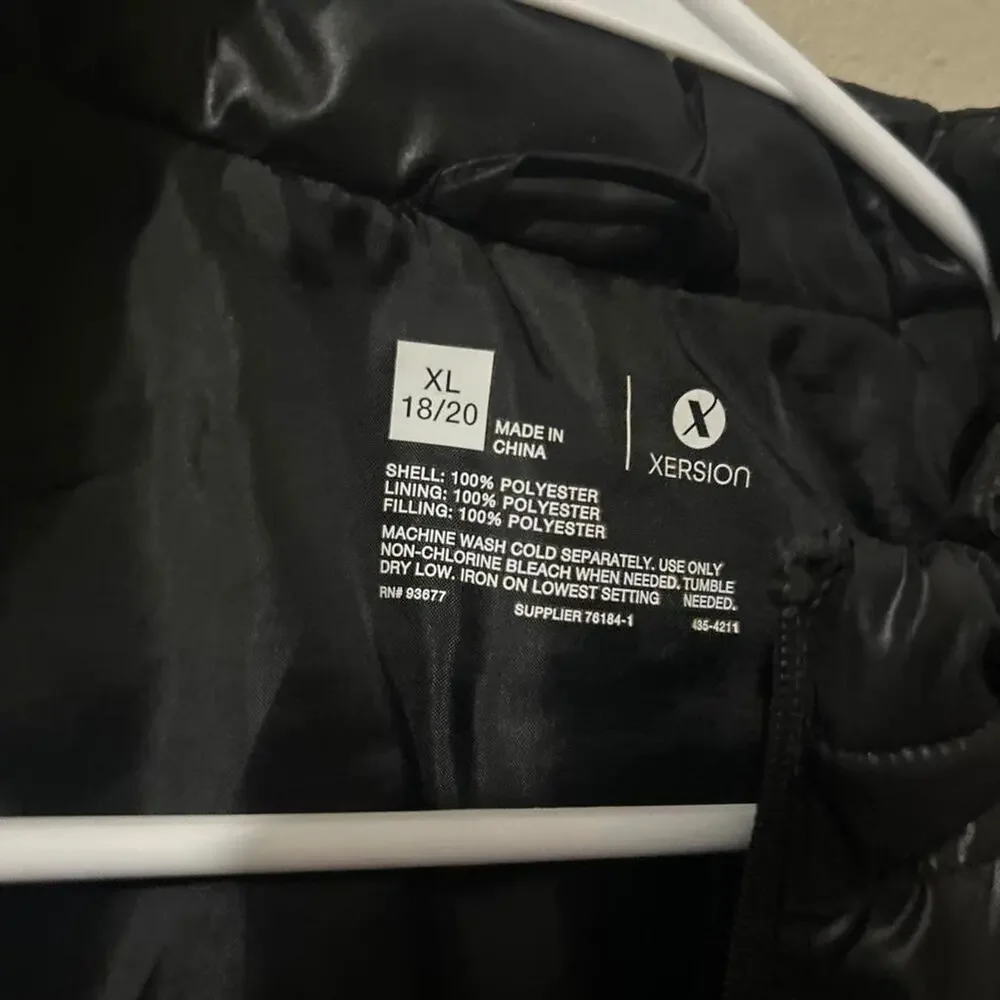 Black puffer vest with horizontal